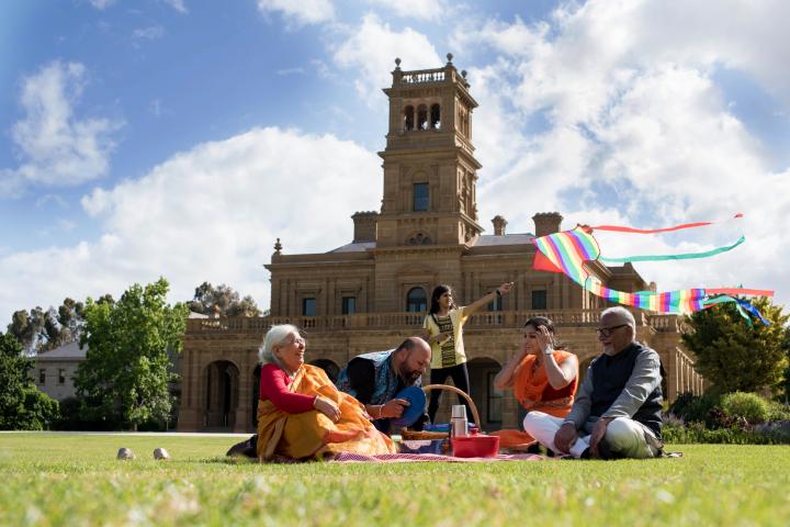 Family having a picnic at Werribee Park Mansion